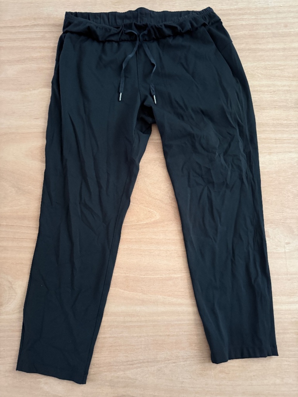 Lululemon On The Fly Pant women's size 10 black athletic athleisure running